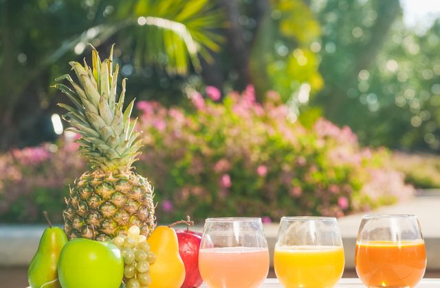 Fruits and fresh juices in the sun