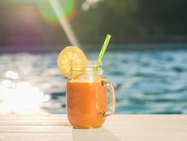 Beverage On Mason Jar With Lemon Slice