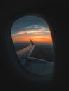 Airplane Window View of White Clouds