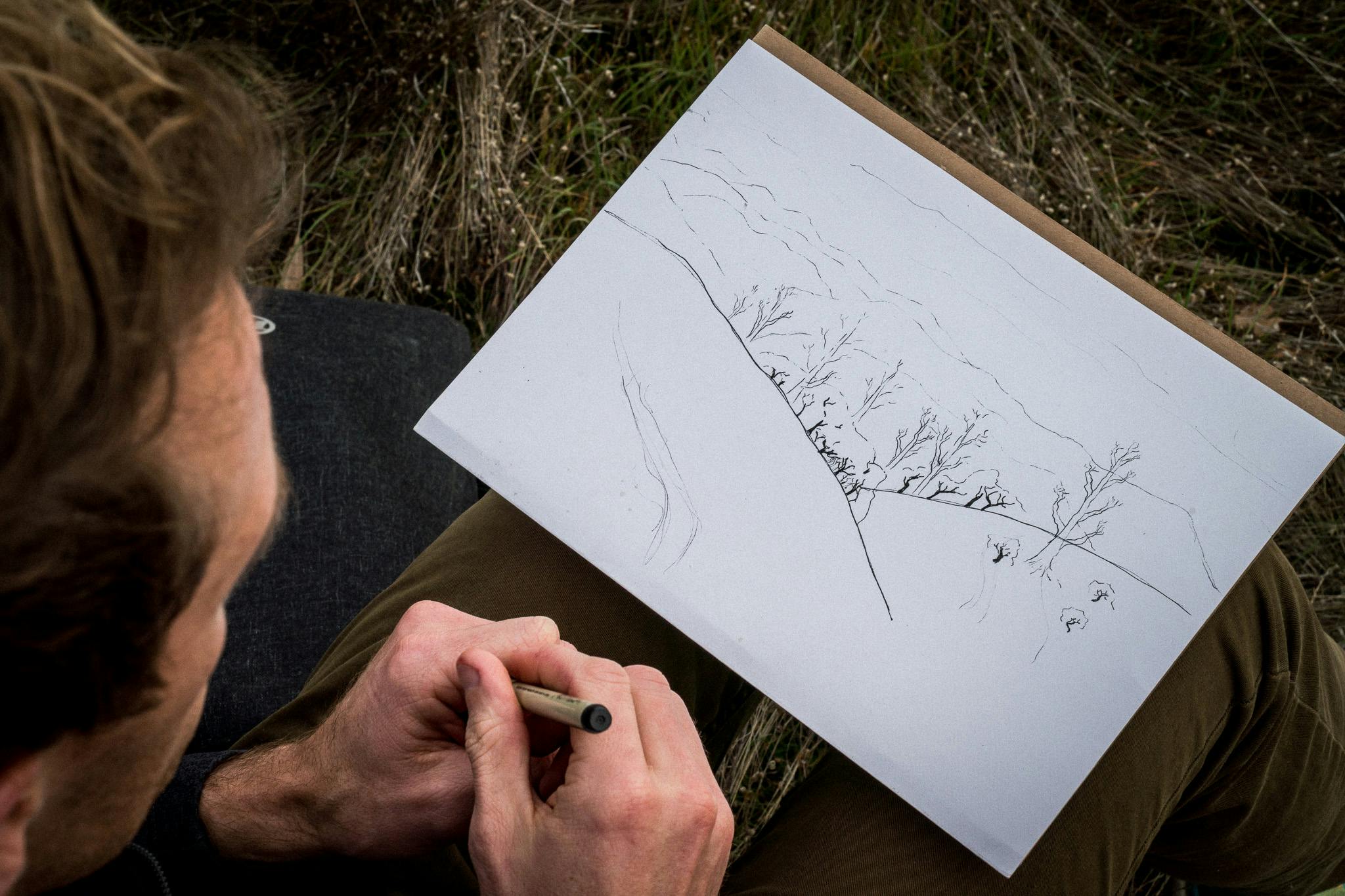 Person drawing trees