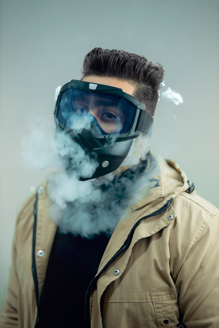 Smoke Around A Person Wearing A Gas Mask