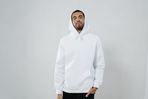 Free Man in White Hoodie and Black Pants Stock Photo