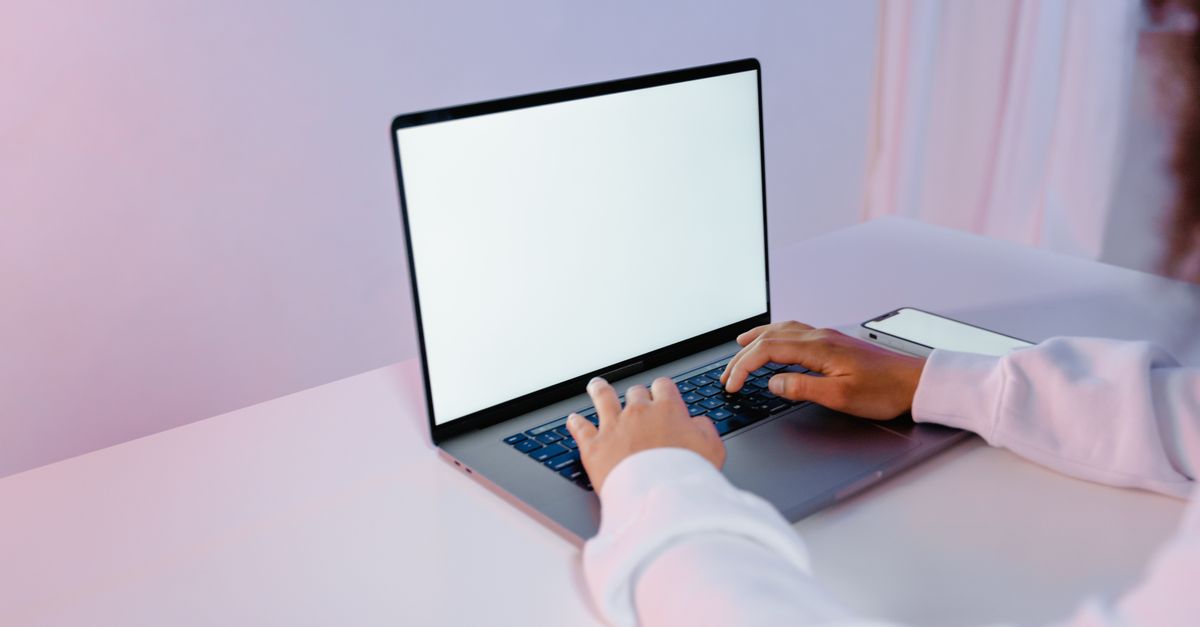A Person Using a Laptop · Free Stock Photo