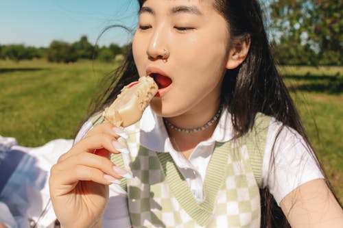 Photo of a Girl Eating Ice Cream