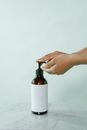 A Person Using a Pump Bottle