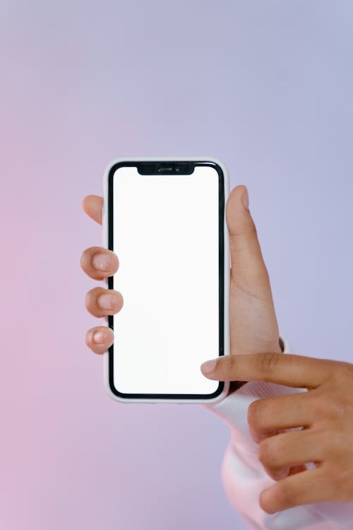 Free Person Holding White Cellphone Stock Photo