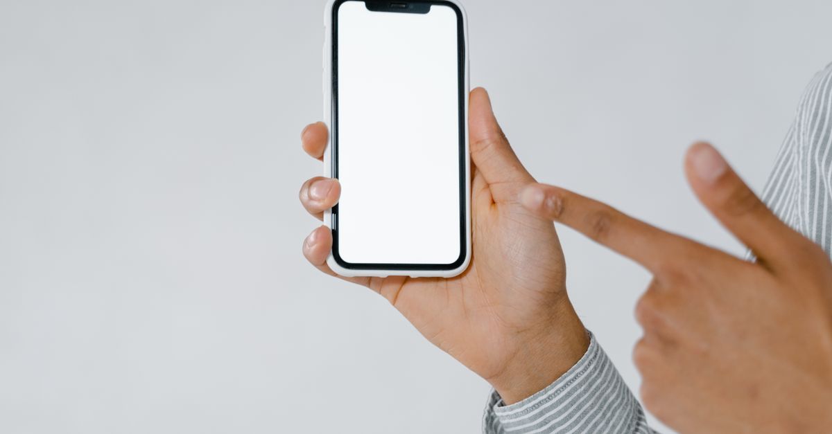 A person reading a promotion's rules on their phone