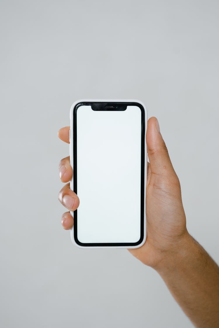 Hand Holding Iphone Mockup