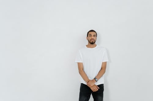 A Man in White Shirt Standing 