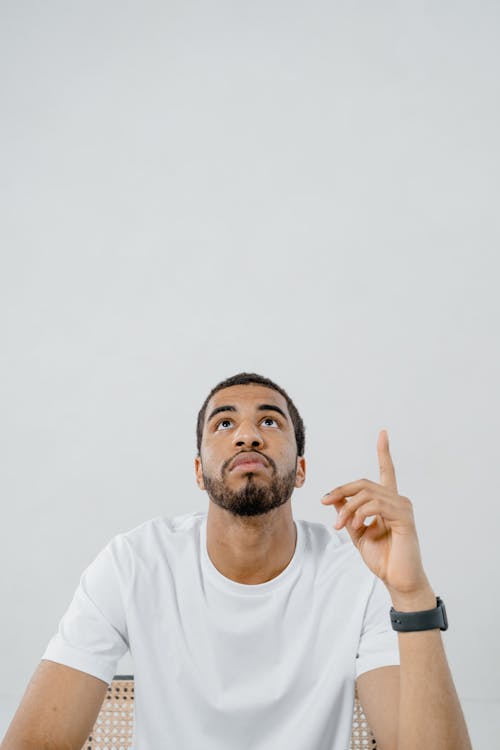 Photo of a Man in White Shirt