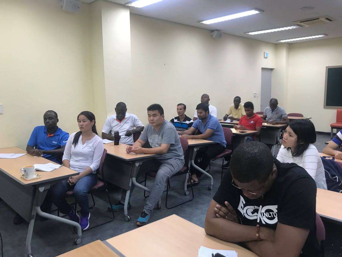 Chickens in a poultry farm enclosure, illustrating avian influenza risk