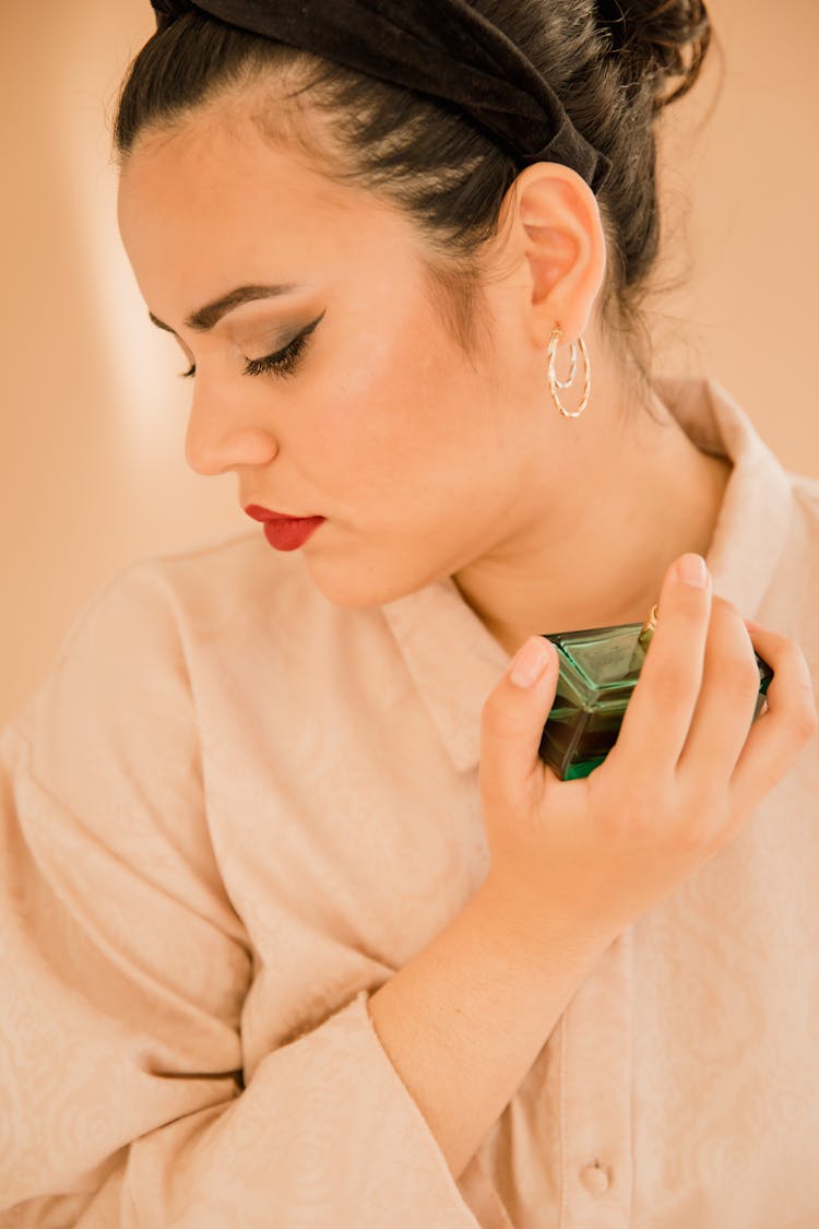 Woman Spraying Perfume