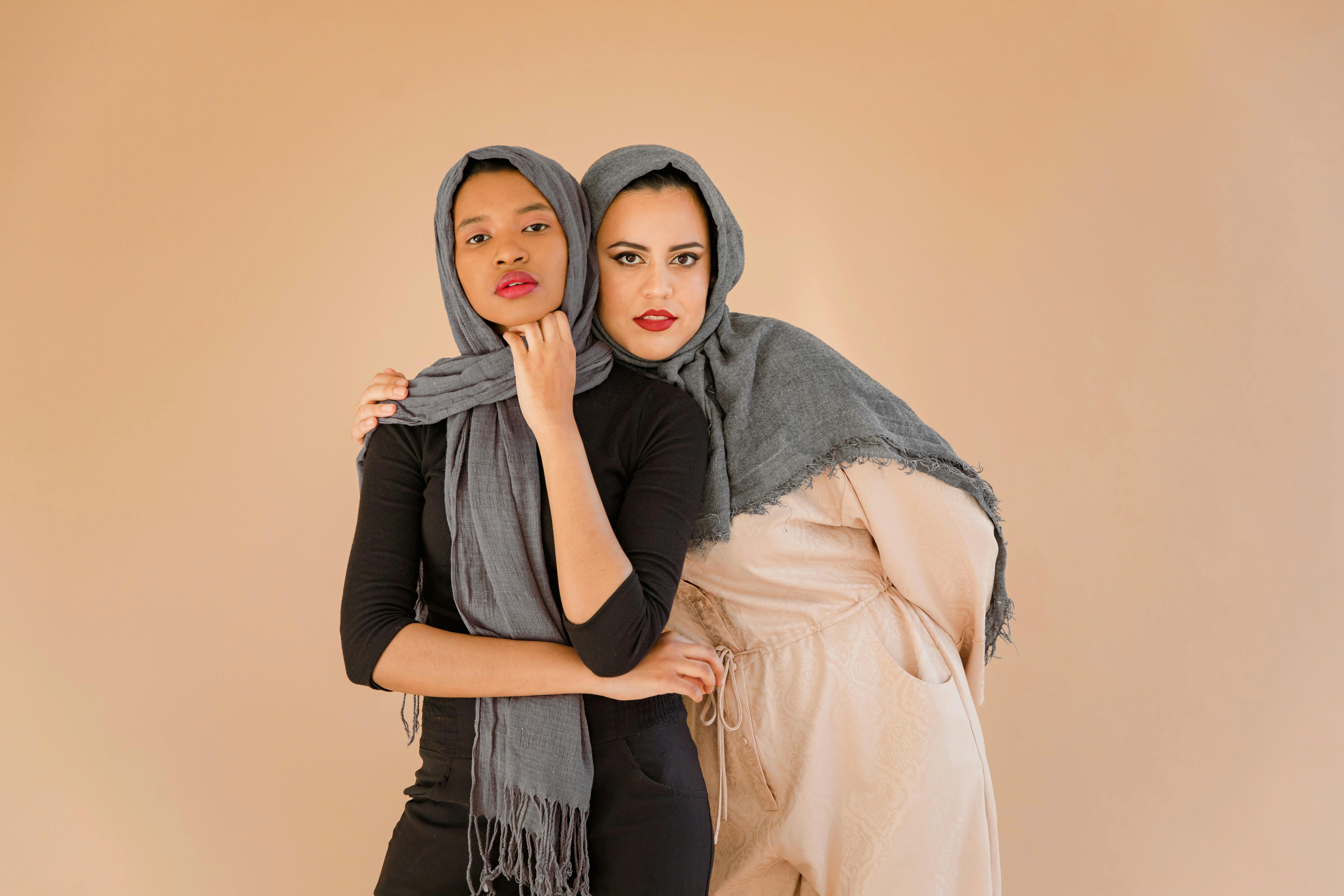 Woman in Gray Hijab and Black Long Sleeve Shirt