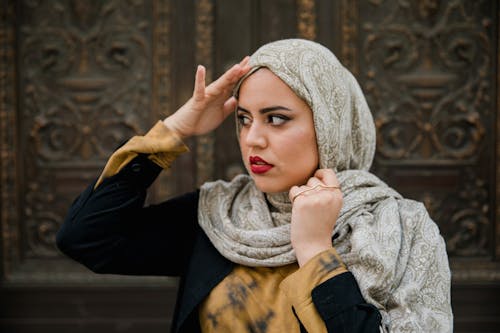 Woman Wearing Hijab and Black Long Sleeve Shirt