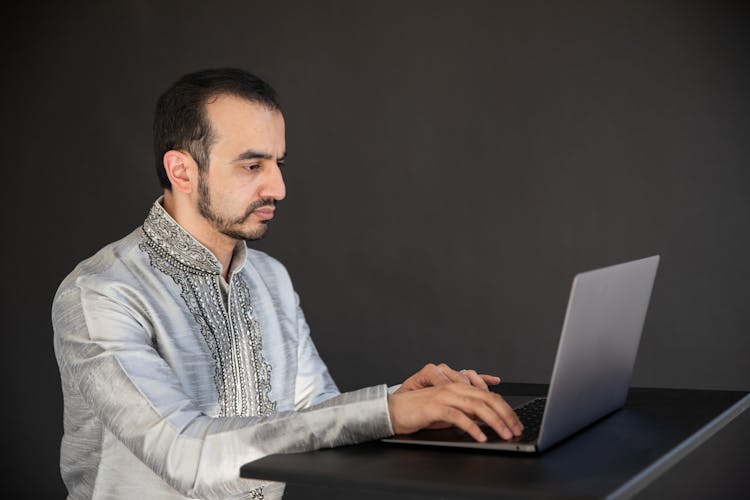 Man Using Black Laptop Computer