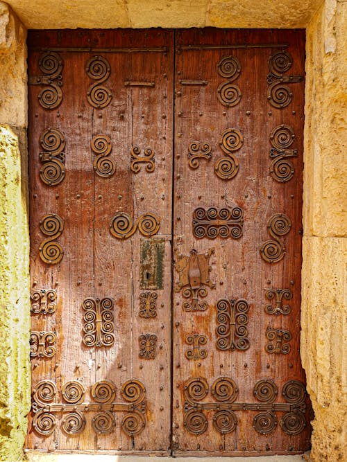 Free A Brown Wooden Door Stock Photo