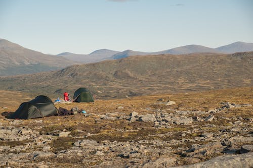 Tents on a Campsite in Mountains 