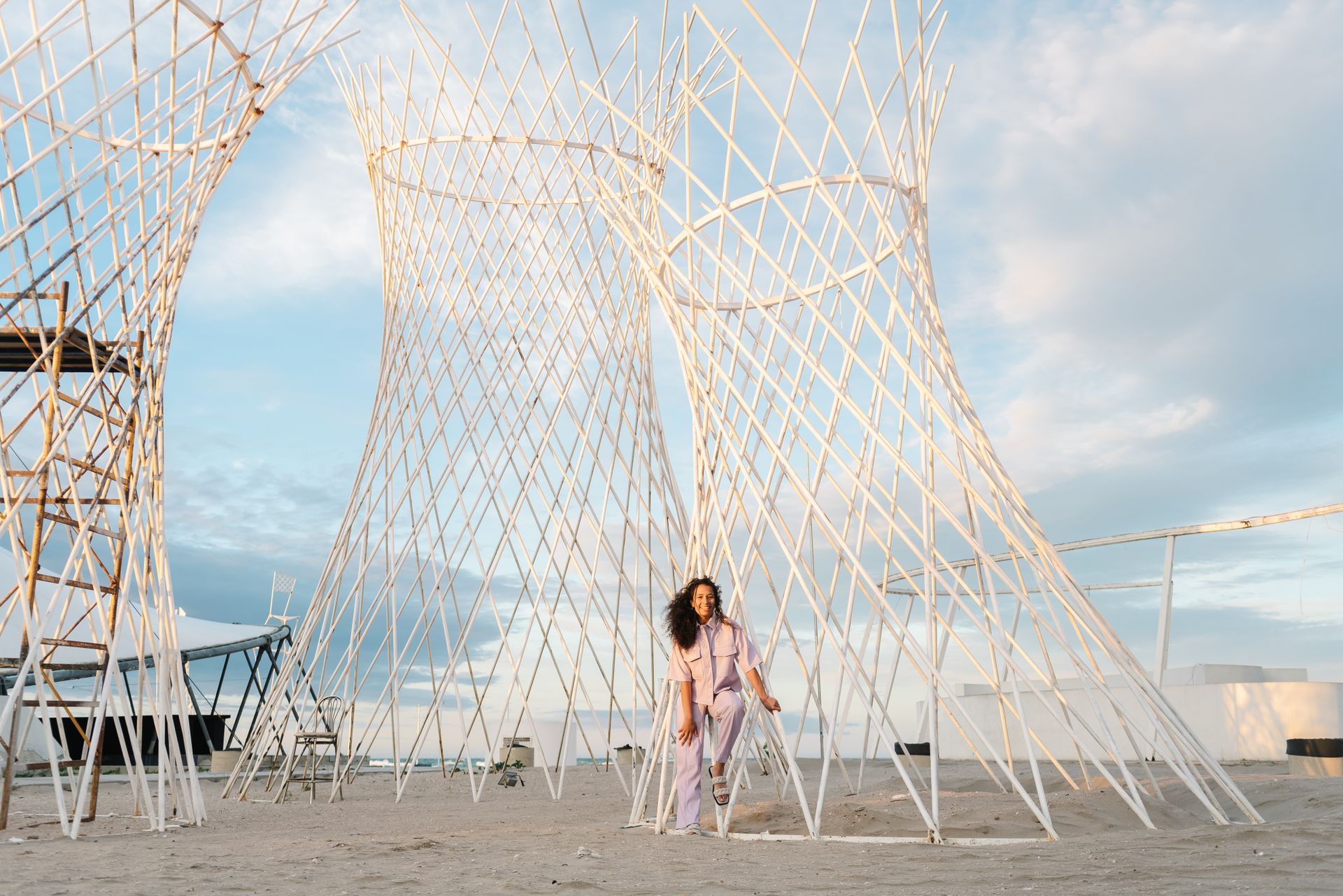 Woman Wearing Button Up Polo Standing Beside Steel Tube Structure