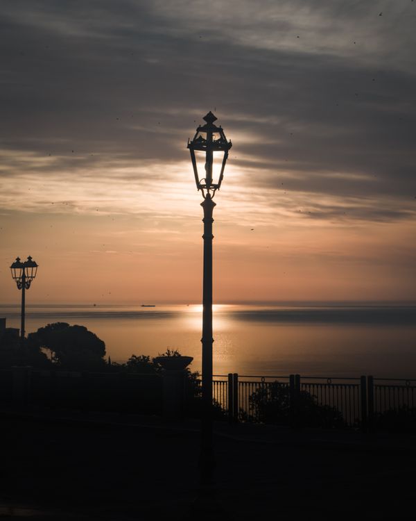 Light Posts Sunset Silhouette of Lamp Post during Sunset · Free Stock Photo