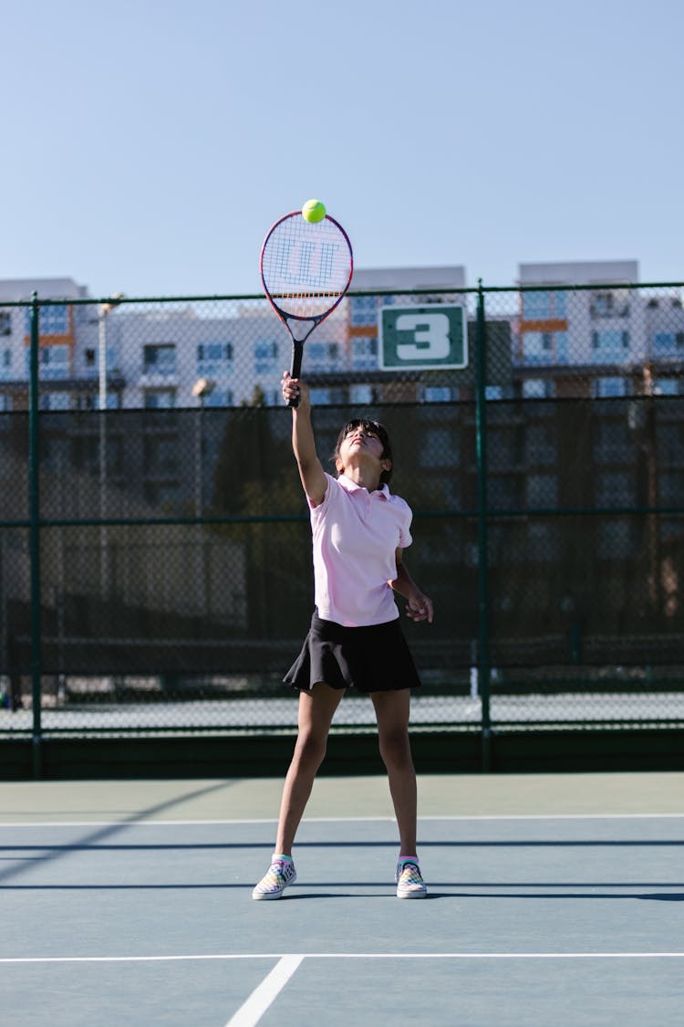 Girl Playing Tennis