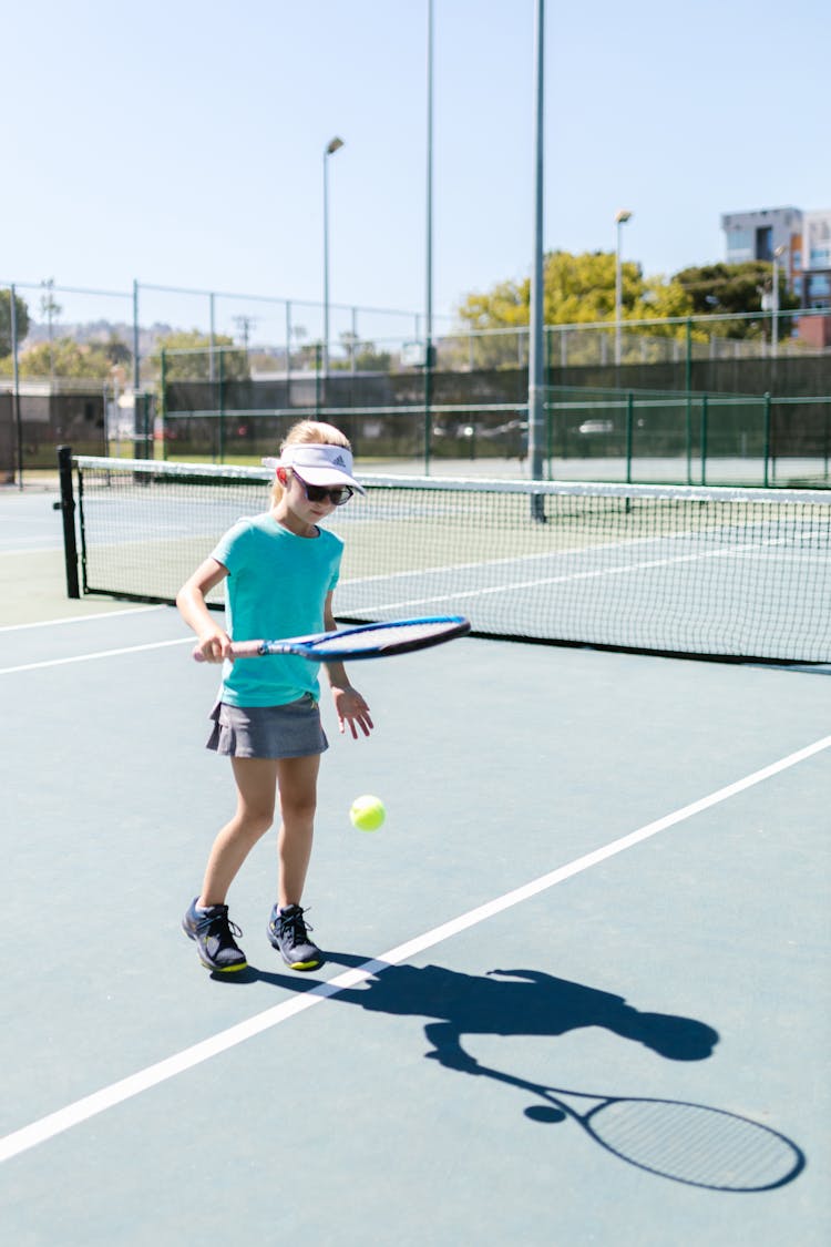 Girl Playing Tennis