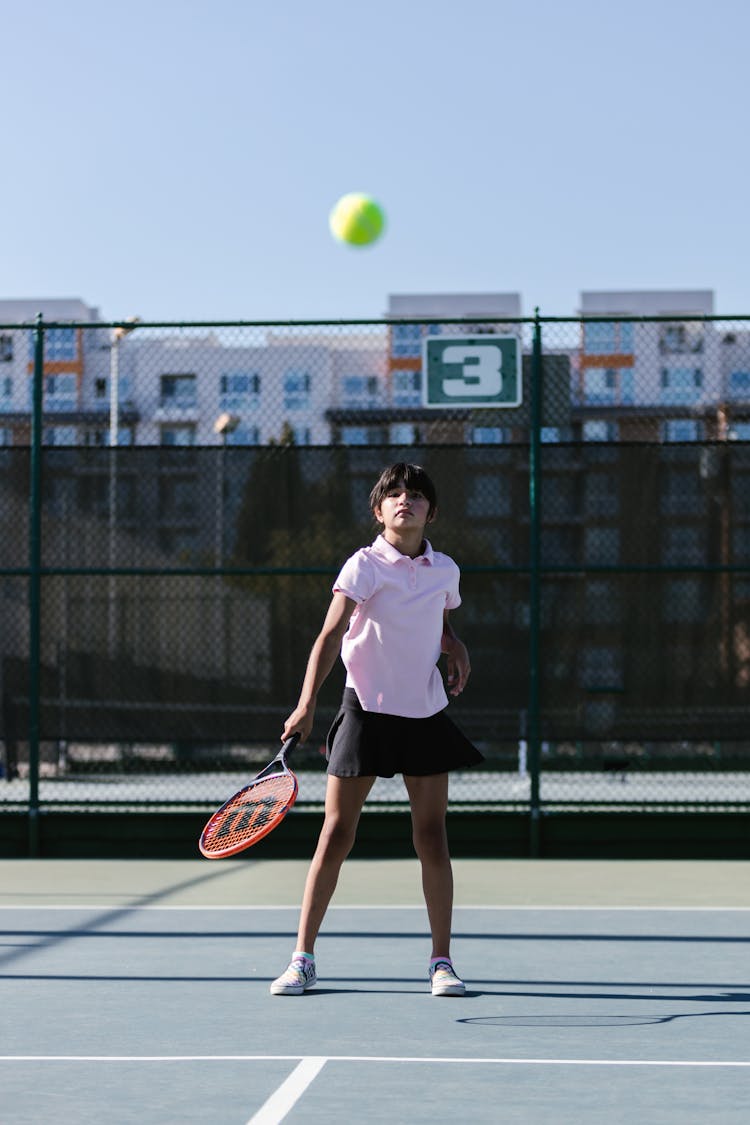 Girl Playing Tennis