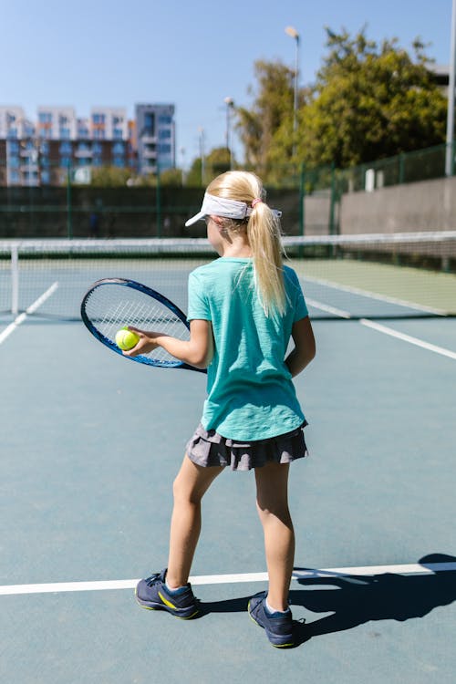 Free Girl Playing Tennis Stock Photo