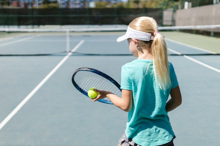 Girl Playing Tennis