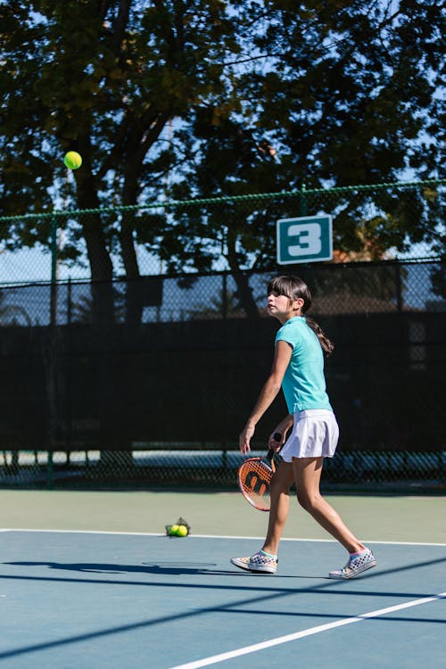 Girl Playing Tennis