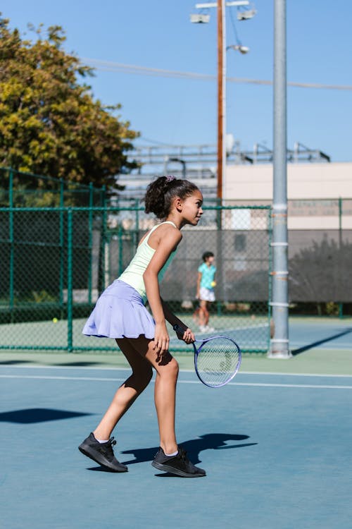 Girl Playing Tennis