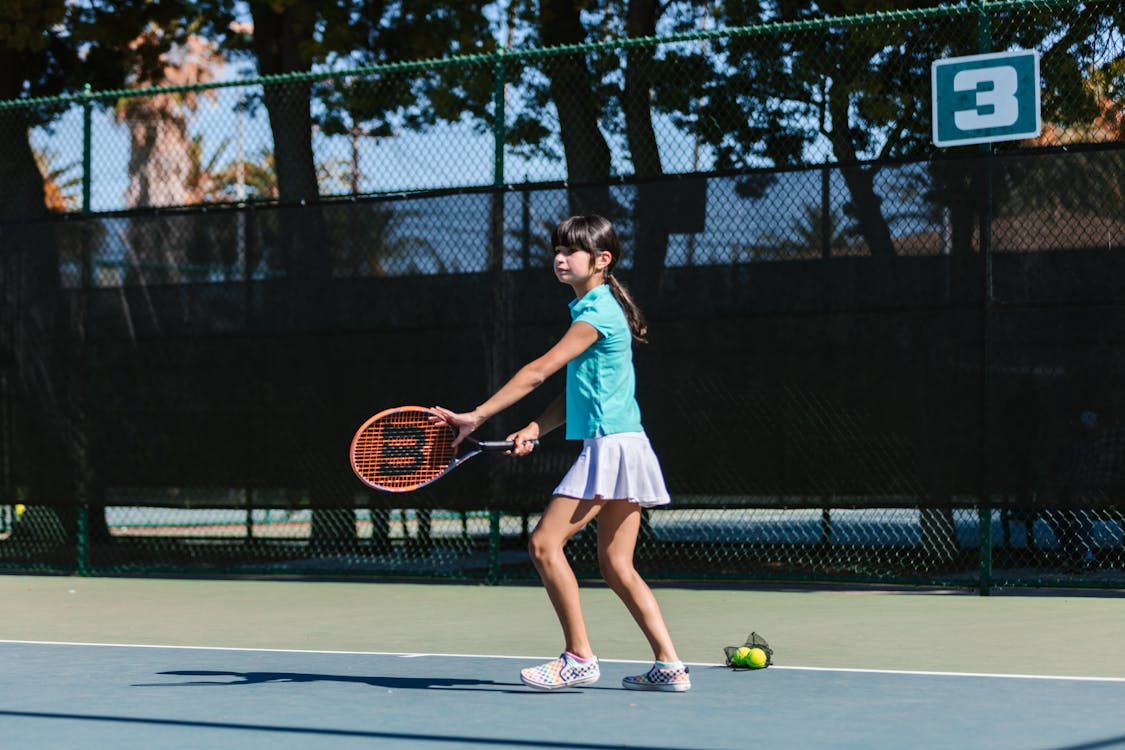 Girl Playing Tennis