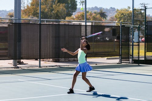 Girl Playing Tennis