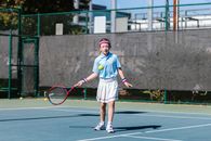 Girl Playing Tennis
