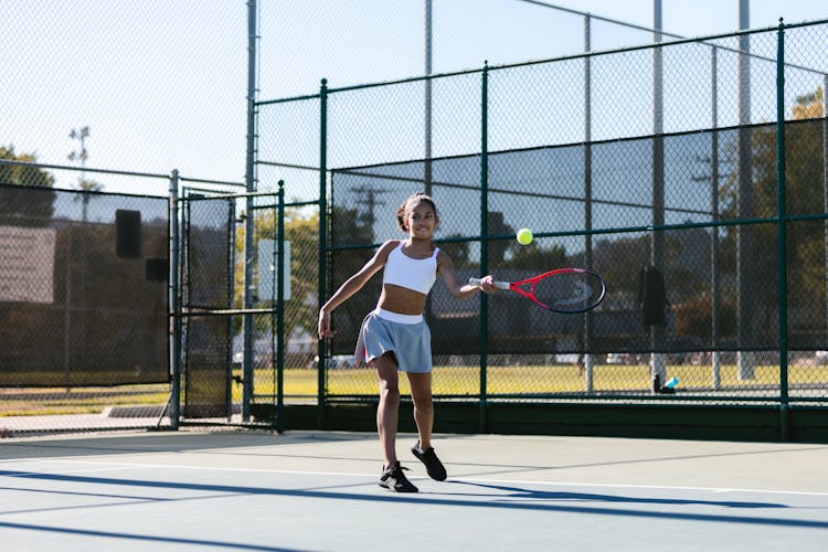 Girl Playing Tennis