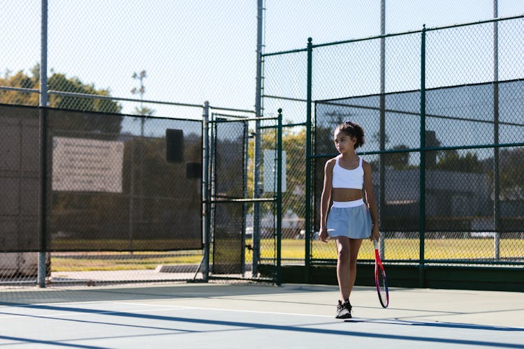 Girl Playing Tennis