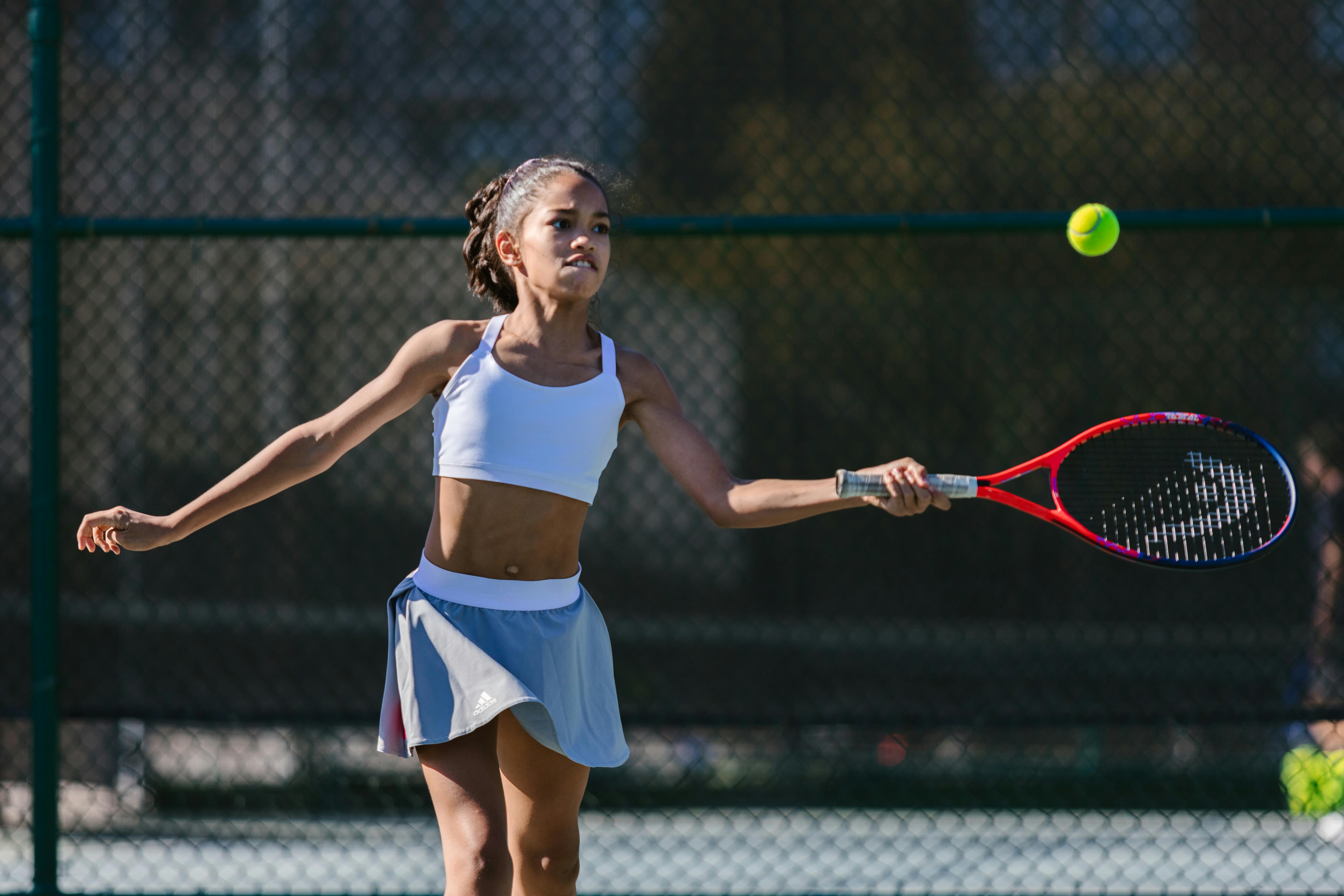 Girls Wearing Sportswear Standing by the Tennis Net · Free Stock Photo