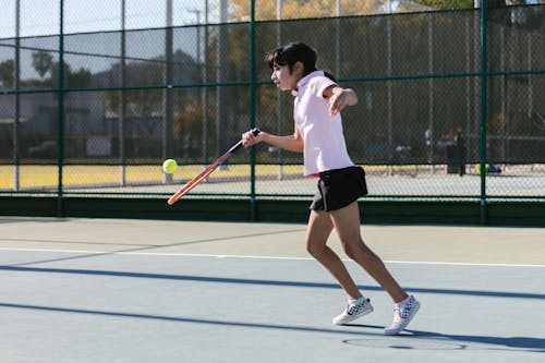 Girl Playing Tennis