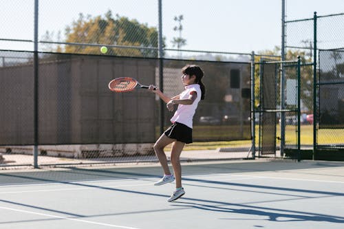 Girl Playing Tennis