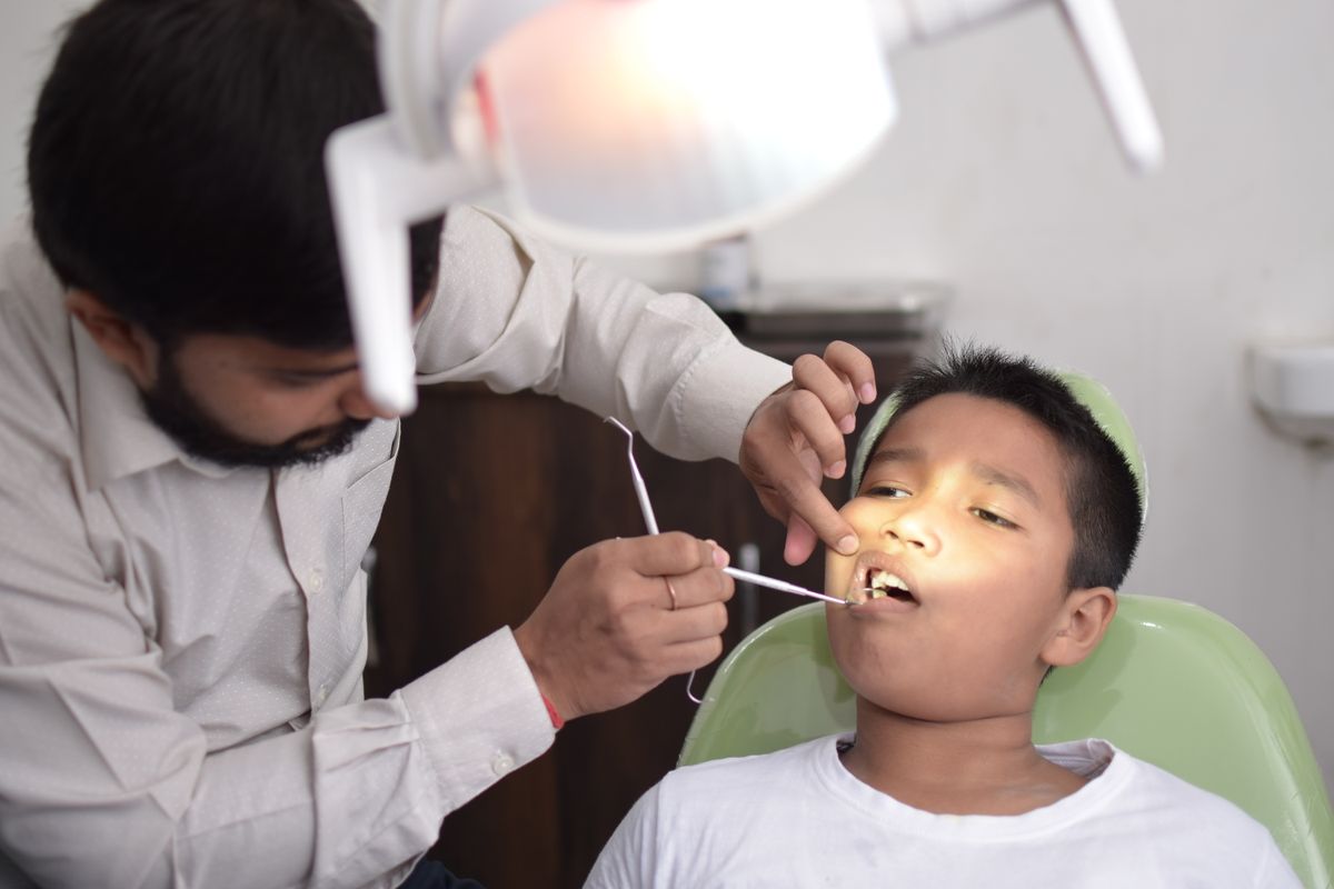 Child having a comfortable dental checkup