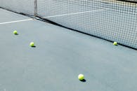Tennis Ball on Tennis Court