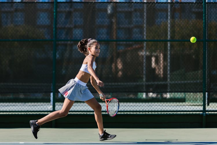 Girl Playing Tennis