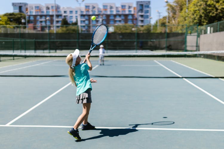 Girl Playing Tennis