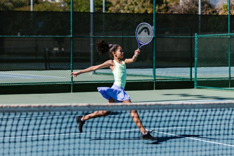 Girl Playing Tennis