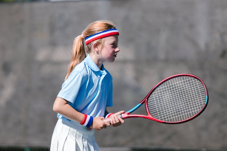 Girl Playing Tennis