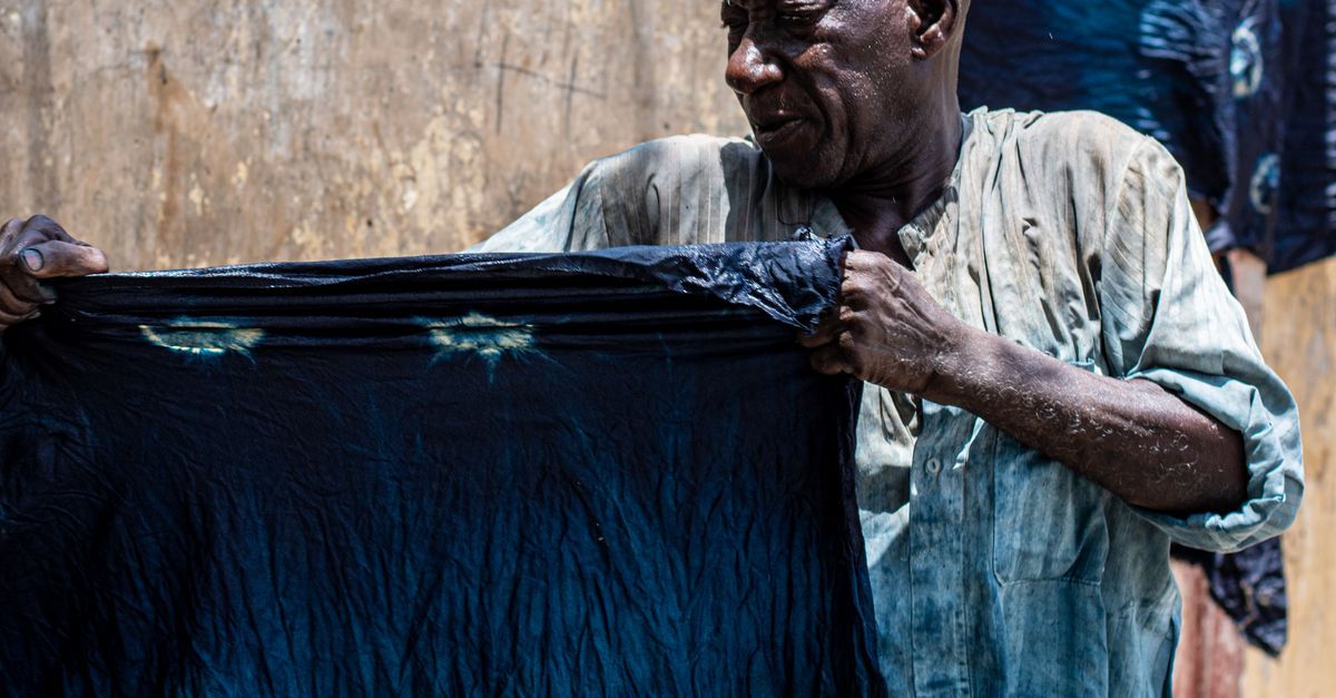 Man Color Making Man Creating Color Fabric Outdoors · Free Stock Photo