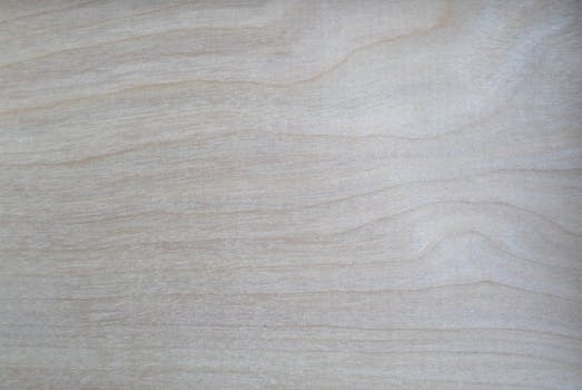 Close-up of a light wood texture with natural grain, perfect for backgrounds.