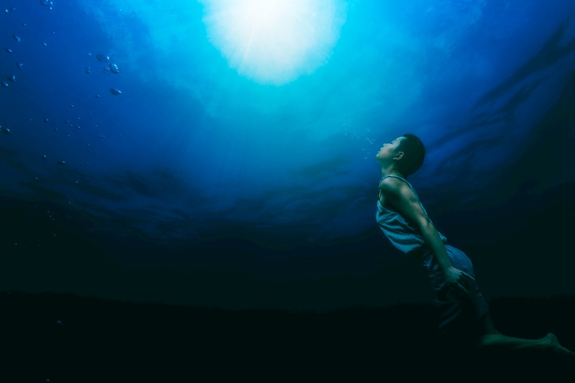 Free Painting of a Person Swimming Underwater Stock Photo