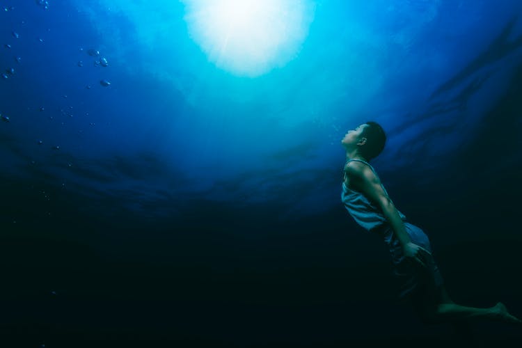 Painting Of A Person Swimming Underwater