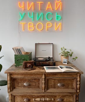 Cozy vintage interior with a turntable and neon sign for a classic decor feel.