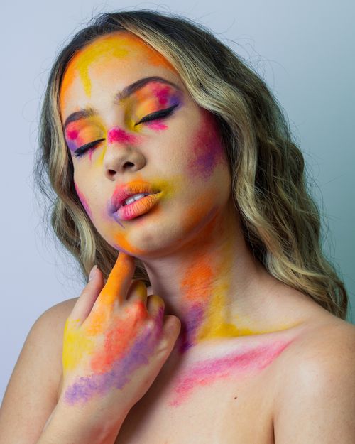 Free Colorful artistic makeup portrait of a young woman with closed eyes. Stock Photo